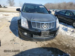 2014 Cadillac SRX Premium Collection z VIN 3GYFNGE38ES577313, wystawiony jako Copart lot #87679045 z przebiegiem 92 070 mil mil oraz Szkoda całkowita • Salvage title. Historia ofert i sprzedaży dostępna na DreamBid. Obrazek 5.