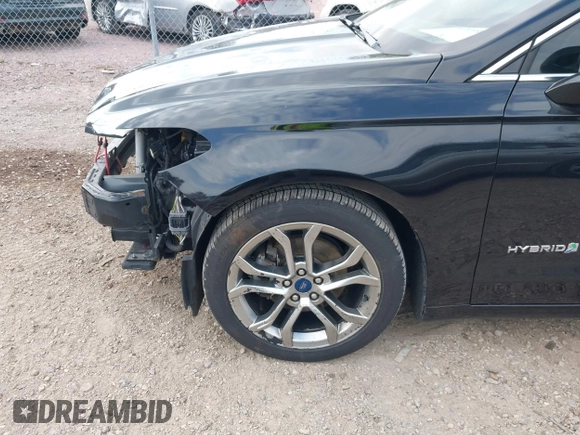 2019 Ford Fusion Hybrid Titanium with VIN 3FA6P0RU4KR144445, listed as a IAAI auction lot 42059840 with 90,617 mi miles. Bid and sale history available at carsss.com. Image 19.