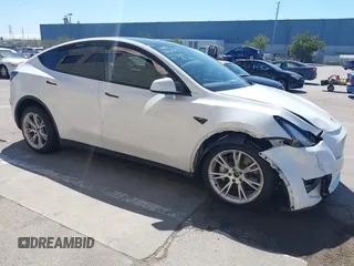 2023 Tesla Model Y Long Range with VIN 7SAYGDEE2PF696336, listed as a IAAI auction lot 41894686 with 34,203 mi miles. Bid and sale history available at carsss.com. Image 1.