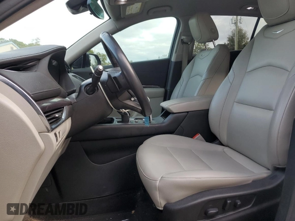 2020 Cadillac XT4 FWD Luxury with VIN 1GYAZAR47LF142704, listed as a Copart auction lot 86730714 with 122,356 mi miles and Salvage Title. Bid and sale history available at DreamBid. Image 7.