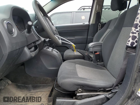 2016 Jeep Compass Sport with VIN 1C4NJDBB3GD520141, listed as a Copart auction lot 56902885 with 147,154 mi miles and Salvage title. Bid and sale history available at DreamBid. Image 7.