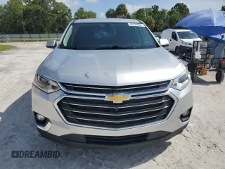 2019 Chevrolet Traverse LT Cloth z VIN 1GNERGKW8KJ320242, wystawiony jako Copart lot #60324095 z przebiegiem 103 680 mil mil oraz Szkoda całkowita • Salvage title. Historia ofert i sprzedaży dostępna na DreamBid. Obrazek 5.