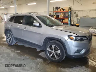 2019 Jeep Cherokee Limited with VIN 1C4PJMDX6KD360895, listed as a Copart auction lot 52708845 with 101,950 mi miles and Salvage Title. Bid and sale history available at carsss.com. Image 4.