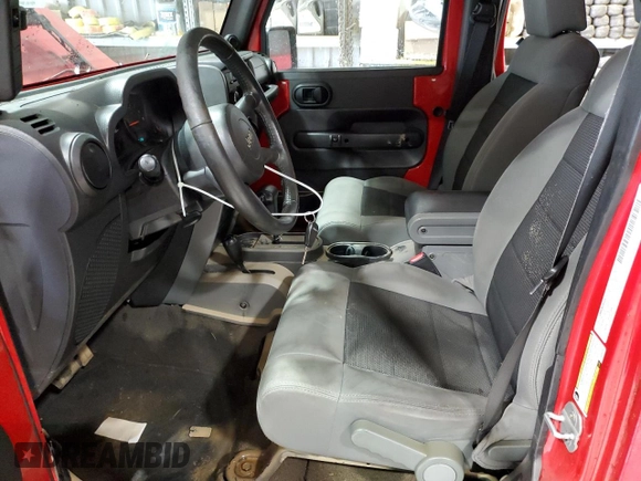 2008 Jeep Wrangler Unlimited X with VIN 1J8GA39128L645762, listed as a Copart auction lot 57888345 with 205,178 mi miles and Salvage title. Bid and sale history available at DreamBid. Image 7.