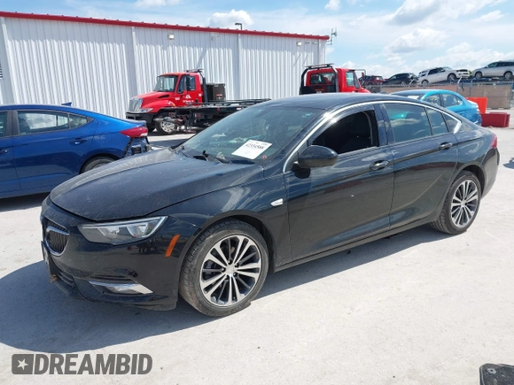 2018 Buick Regal Essence with VIN W04GP6SX5J1120700, listed as a IAAI auction lot 42334588 with 131,926 mi miles and . Bid and sale history available at DreamBid. Image 2.