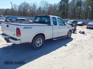2003 Ford F-150 XL with VIN 2FTRX17273CA82712, listed as a IAAI auction lot 41649838 with 1 mi miles. Bid and sale history available at carsss.com. Image 4.