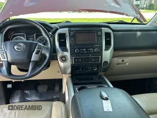 2016 Nissan Titan SL z VIN 1N6BA1F26GN512666, wystawiony jako Copart lot #59731495 z przebiegiem 120 182 mil mil oraz Czysty tytuł • Clean title. Historia ofert i sprzedaży dostępna na DreamBid. Obrazek 9.