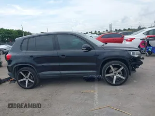 2014 Volkswagen Tiguan SE z VIN WVGAV3AXXEW535128, wystawiony jako IAAI lot #41882213 z przebiegiem 103 161 mil mil oraz . Historia ofert i sprzedaży dostępna na DreamBid. Obrazek 13.