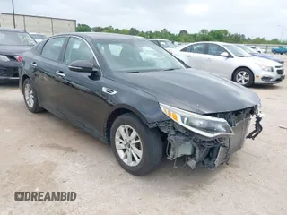 2018 Kia Optima LX z VIN 5XXGT4L3XJG214738, wystawiony jako IAAI lot #41970457 z przebiegiem 241 895 mil mil oraz . Historia ofert i sprzedaży dostępna na DreamBid. Obrazek 1.