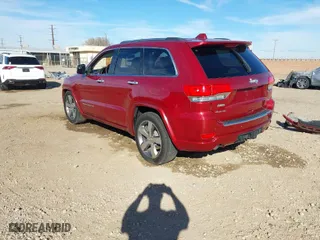 2014 Jeep Grand Cherokee Overland with VIN 1C4RJFCGXEC280970, listed as a IAAI auction lot 41504380 with 115,534 mi miles. Bid and sale history available at carsss.com. Image 3.