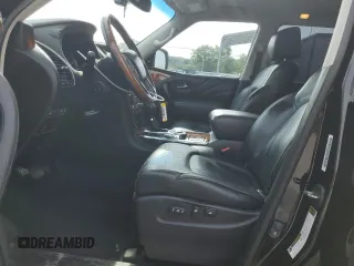 2015 Infiniti QX80 z VIN JN8AZ2ND5F9770320, wystawiony jako Copart lot #55305965 z przebiegiem 168 832 mil mil oraz Czysty tytuł • Clean title. Historia ofert i sprzedaży dostępna na DreamBid. Obrazek 7.