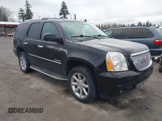 2011 GMC Yukon Denali with VIN 1GKS2EEF9BR261336, listed as a IAAI auction lot 41796533 with 149,808 mi miles. Bid and sale history available at carsss.com. Image 1.