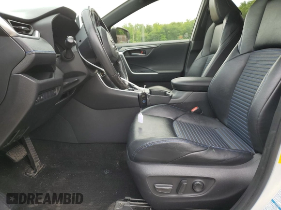 2019 Toyota RAV4 Hybrid XSE with VIN JTMEWRFV4KJ004433, listed as a Copart auction lot 58400445 with 101,108 mi miles and Salvage title. Bid and sale history available at DreamBid. Image 7.