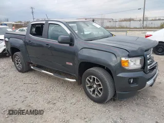 2016 GMC Canyon 4WD SLE with VIN 1GTG6CE38G1165896, listed as a IAAI auction lot 40716621 with 116,684 mi miles. Bid and sale history available at carsss.com. Image 1.