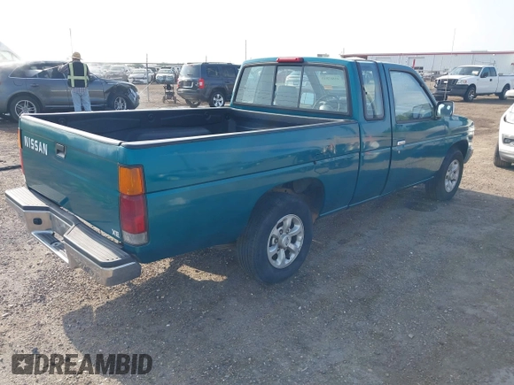 1997 Nissan Frontier XE z VIN 1N6SD16SXVC330579, wystawiony jako IAAI lot #41867843 z przebiegiem 135 434 mil mil oraz . Historia ofert i sprzedaży dostępna na DreamBid. Obrazek 4.