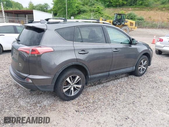 2016 Toyota RAV4 XLE with VIN 2T3RFREV4GW494108, listed as a IAAI auction lot 42234227 with 102,216 mi miles and . Bid and sale history available at DreamBid. Image 4.