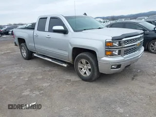2015 Chevrolet Silverado 1500 LT with VIN 1GCRCREC2FZ170094, listed as a IAAI auction lot 41634824 with 61,686 mi miles. Bid and sale history available at carsss.com. Image 1.
