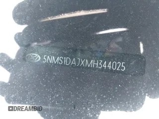 2021 Hyundai Santa Fe SE with VIN 5NMS1DAJXMH344025, listed as a IAAI auction lot 42477124 with 17,129 mi miles and . Bid and sale history available at DreamBid. Image 17.