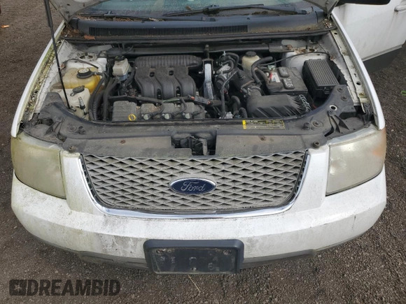 2005 Ford Freestyle SEL z VIN 1FMZK05185GA22180, wystawiony jako Copart lot #71654974 z przebiegiem Nie podano mil oraz Czysty tytuł • Clean title. Historia ofert i sprzedaży dostępna na DreamBid. Obrazek 12.