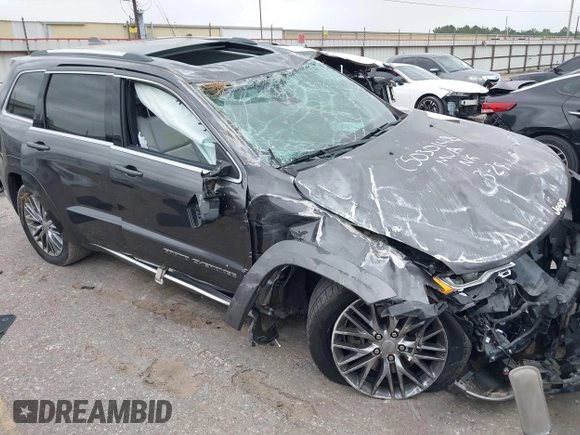 2018 Jeep Grand Cherokee Summit with VIN 1C4RJFJT1JC370907, listed as a IAAI auction lot 41944933 with 110,597 mi miles and . Bid and sale history available at DreamBid. Image 1.