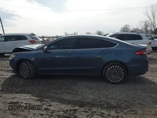 2018 Ford Fusion Titanium with VIN 3FA6P0D94JR187880, listed as a IAAI auction lot 41690869 with 120,214 mi miles and . Bid and sale history available at DreamBid. Image 14.