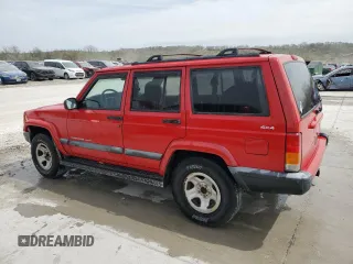 1999 Jeep Cherokee Sport with VIN 1J4FF68S3XL667570, listed as a Copart auction lot 52821105 with 173,712 mi miles and Salvage Title. Bid and sale history available at DreamBid. Image 2.