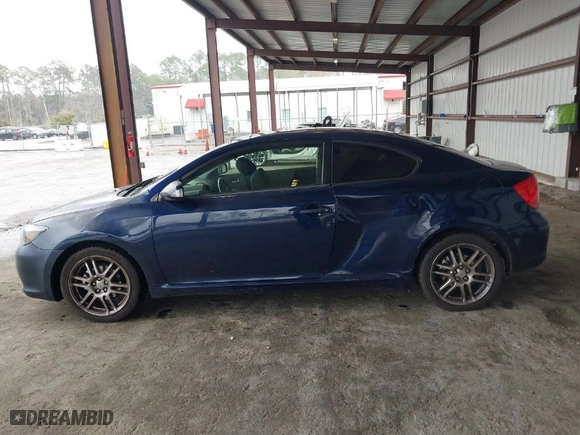 2006 Scion tC with VIN JTKDE177260092306, listed as a IAAI auction lot 41614438 with 223,208 mi miles. Bid and sale history available at carsss.com. Image 14.