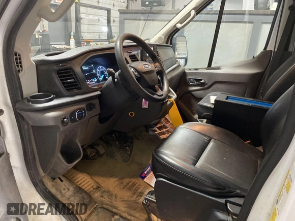 2020 Ford Transit Cargo with VIN 1FTBR1CG6LKA17312, listed as a IAAI auction lot 42132194 with 173,479 mi miles. Bid and sale history available at carsss.com. Image 1.
