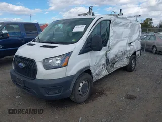 2022 Ford Transit Cargo with VIN 1FTBR1YG6NKA84259, listed as a IAAI auction lot 40764177 with 80,042 mi miles and . Bid and sale history available at DreamBid. Image 2.