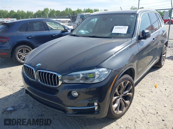 2014 BMW X5 xDrive35d with VIN 5UXKS4C57E0J93982, listed as a IAAI auction lot 42085173 with 169,908 mi miles. Bid and sale history available at carsss.com. Image 23.