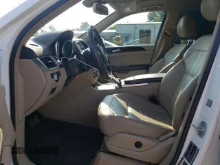 2016 Mercedes-Benz GL with VIN 4JGDF6EE9GA623379, listed as a Copart auction lot 71314214 with 142,745 mi miles and Salvage Title. Bid and sale history available at carsss.com. Image 7.