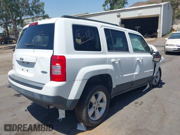 2014 Jeep Patriot Latitude with VIN 1C4NJRFB4ED549734, listed as a IAAI auction lot 42543649 with Not provided miles and . Bid and sale history available at DreamBid. Image 4.