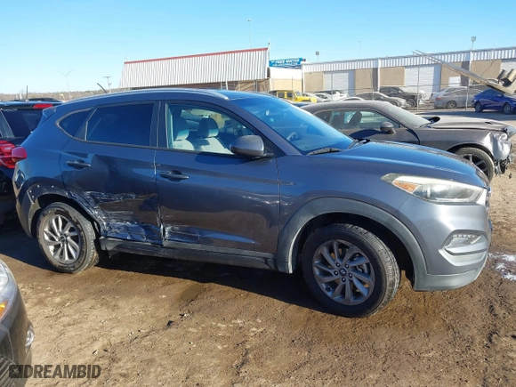 2016 Hyundai Tucson SE with VIN KM8J33A45GU089996, listed as a IAAI auction lot 41687069 with 129,957 mi miles. Bid and sale history available at carsss.com. Image 13.