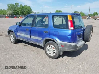 2001 Honda CR-V LX z VIN JHLRD18431C026474, wystawiony jako IAAI lot #42326248 z przebiegiem 245 819 mil mil oraz . Historia ofert i sprzedaży dostępna na DreamBid. Obrazek 3.