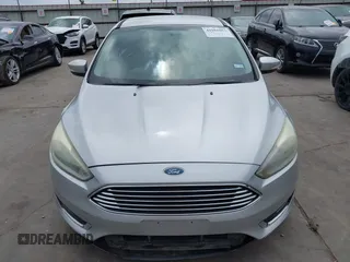2015 Ford Focus Titanium with VIN 1FADP3N23FL356822, listed as a IAAI auction lot 41981053 with 115,584 mi miles and . Bid and sale history available at DreamBid. Image 13.