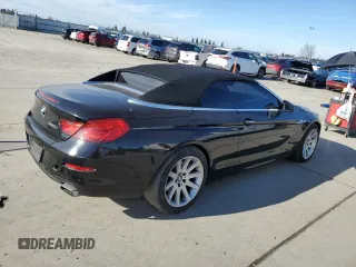 2012 BMW 6 Series 650i z VIN WBALZ3C51CDL72422, wystawiony jako Copart lot #87447914 z przebiegiem 115 376 mil mil oraz Szkody całkowita. Historia ofert i sprzedaży dostępna na DreamBid. Obrazek 3.