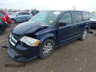 2014 Dodge Grand Caravan American Value with VIN 2C4RDGBG3ER104932, listed as a IAAI auction lot 42126784 with 171,206 mi miles and . Bid and sale history available at DreamBid. Image 2.
