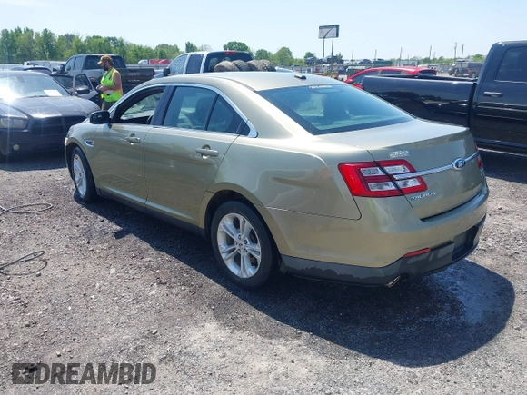 2013 Ford Taurus SEL with VIN 1FAHP2E88DG105557, listed as a IAAI auction lot 42040773 with 157,705 mi miles and . Bid and sale history available at carsss.com. Image 3.