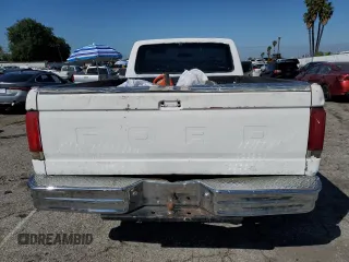 1989 Ford F-150 with VIN 1FTDF15Y6KKB77485, listed as a Copart auction lot 48943525 with 95,808 mi miles and Salvage Title. Bid and sale history available at carsss.com. Image 6.