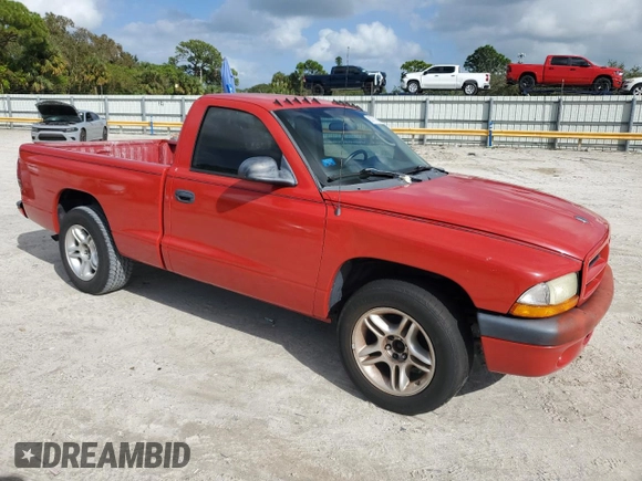 2002 Dodge Dakota z VIN 1B7FL36X72S543943, wystawiony jako Copart lot #80767984 z przebiegiem Nie podano mil oraz Czysty tytuł • Clean title. Historia ofert i sprzedaży dostępna na DreamBid. Obrazek 4.