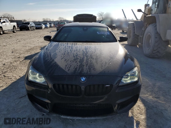 2015 BMW M6 z VIN WBS6C9C5XFD467952, wystawiony jako Copart lot #46312895 z przebiegiem 79 807 mil mil oraz Szkoda całkowita • Salvage title. Historia ofert i sprzedaży dostępna na DreamBid. Obrazek 5.