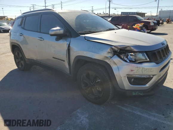 2019 Jeep Compass Latitude with VIN 3C4NJCBB5KT614941, listed as a Copart auction lot 86916084 with 80,884 mi miles and Salvage title. Bid and sale history available at DreamBid. Image 4.