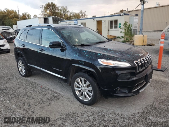 2018 Jeep Cherokee Overland with VIN 1C4PJMJX8JD562138, listed as a Copart auction lot 77249404 with 119,865 mi miles and Salvage Title. Bid and sale history available at carsss.com. Image 4.