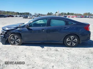 2016 Honda Civic EX-L with VIN 19XFC1F72GE044319, listed as a IAAI auction lot 41823220 with 129,868 mi miles and . Bid and sale history available at DreamBid. Image 14.