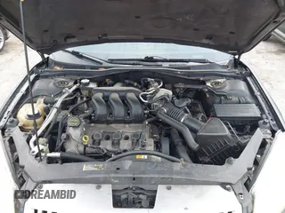 2006 Mercury Milan Premier with VIN 3MEHM08106R604501, listed as a IAAI auction lot 41565575 with 192,699 mi miles and . Bid and sale history available at DreamBid. Image 10.