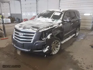 2016 Cadillac Escalade Luxury Collection with VIN 1GYS4BKJ2GR112460, listed as a IAAI auction lot 41498174 with 139,457 mi miles. Bid and sale history available at carsss.com. Image 2.
