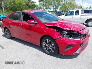 2022 Kia Forte LXS with VIN 3KPF24AD5NE425273, listed as a IAAI auction lot 41815357 with 49,613 mi miles. Bid and sale history available at carsss.com. Image 1.