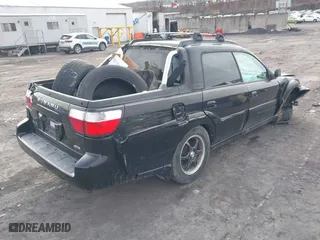 2003 Subaru Baja with VIN 4S4BT61C536100698, listed as a IAAI auction lot 41613071 with 221,393 mi miles. Bid and sale history available at carsss.com. Image 4.