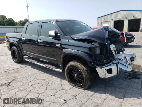 2015 Toyota Tundra 4WD Truck Platinum with VIN 5TFAW5F12FX481787, listed as a Copart auction lot 69725484 with 165,159 mi miles and Salvage Title. Bid and sale history available at carsss.com. Image 4.