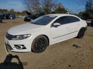 2014 Volkswagen CC R-Line with VIN WVWBP7AN2EE503420, listed as a Copart auction lot 77744894 with 99,679 mi miles and Salvage Title. Bid and sale history available at carsss.com. Image 1.
